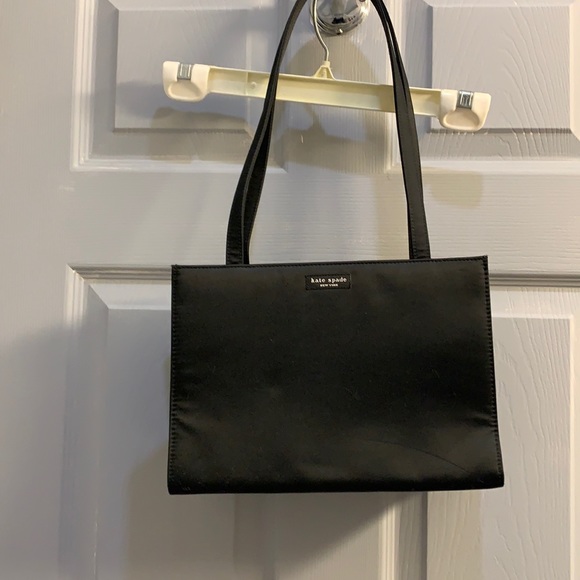 kate spade Handbags - KATE SPADE BLACK PURSE ..slight damage in picture